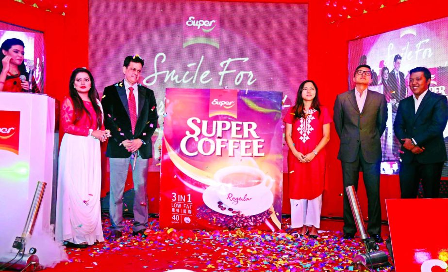Ms Beanus Husain, Managing Director of Hussain Trading Ltd, inaugurating â€˜Super coffeeâ€™ at Spectra Convention Centre in Dhaka on Thursday. J Ekram, Director of the company and singer Kona were present.
