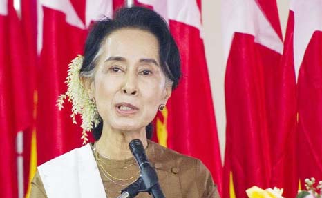 Myanmar election winner Aung San Suu Kyi talking to party activists in Naypyitaw on Wednesday.