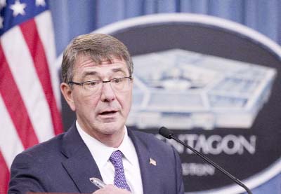 Defence Secretary Ash Carter speaks to reporters at the Pentagon.