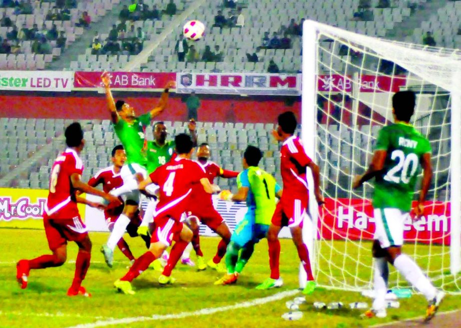 A moment of the match of the Bangabandhu Gold Cup International Football Tournament between Bangladesh and Nepal at the Bangabandhu National Stadium on Friday. The match ended in a goalless draw.