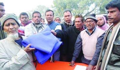 SAPAHAR (Naogaon): Winter clothes were distributed by Jagorani Shava Sangstha at Dighir Hat Bazar in Sapahar Upazila on Friday.