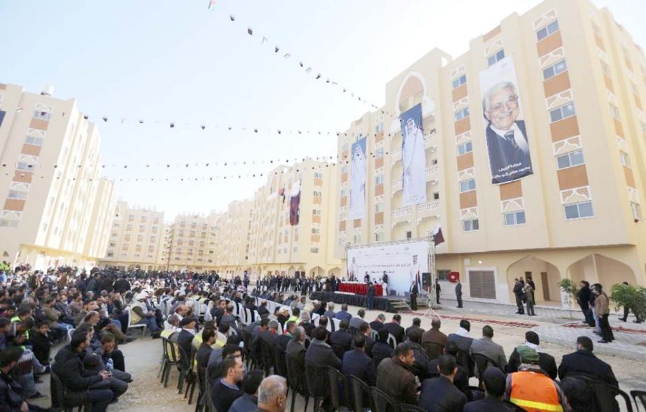 Palestinians attend the opening of the Sheikh Hamad residential project in the southern Gaza Strip town of Khan Younis on Saturday.
