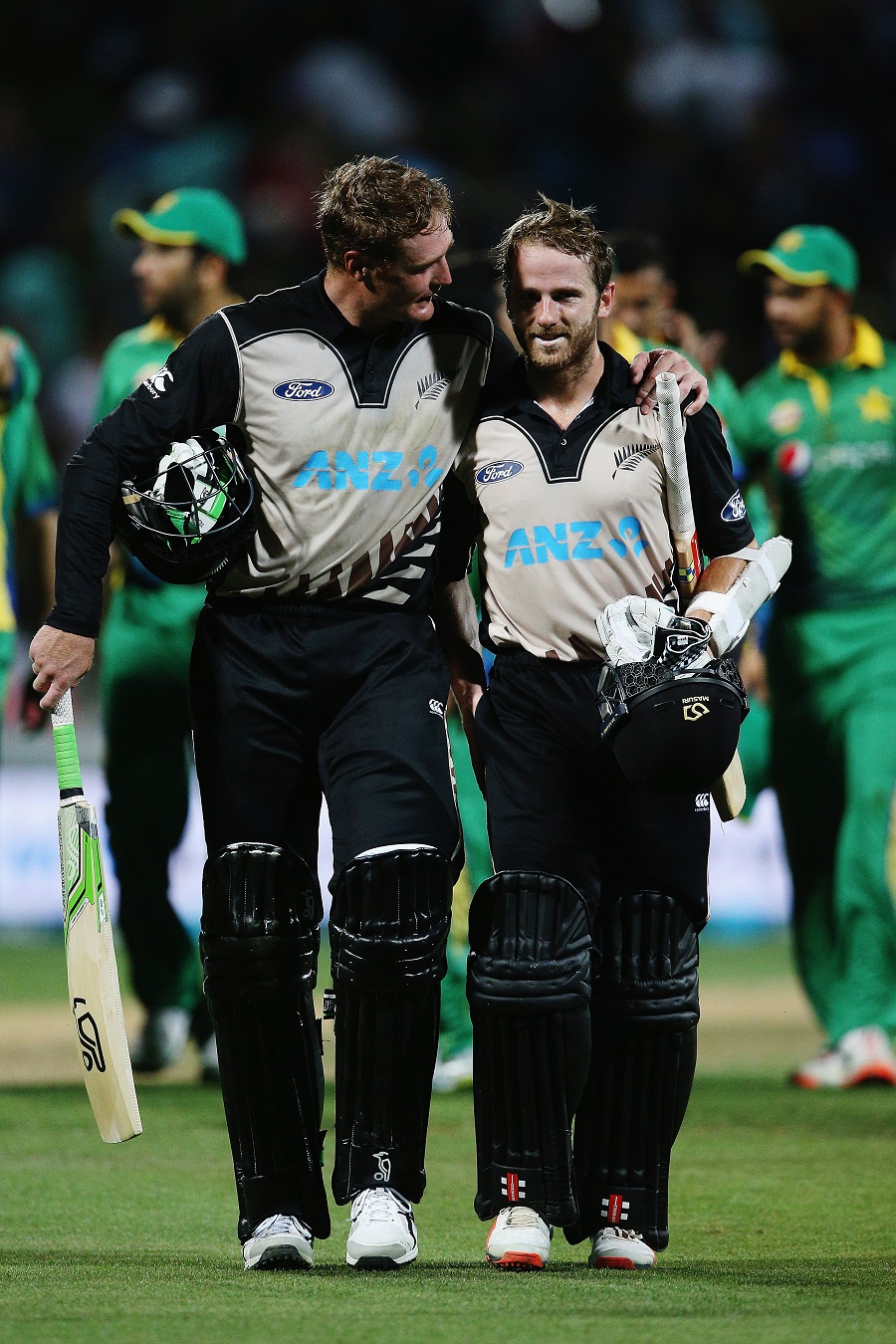 Martin Guptill and Kane Williamson of New Zealand walk off after securing a ten-wicket win against Pakistan in 2nd T20I at Hamilton on Sunday.