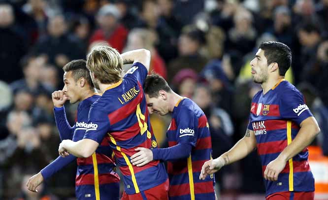 FC Barcelona's Neymar (left) celebrates scoring against Athletic Bilbao during a Spanish La Liga soccer match at the Camp Nou Stadium in Barcelona, Spain on Sunday.