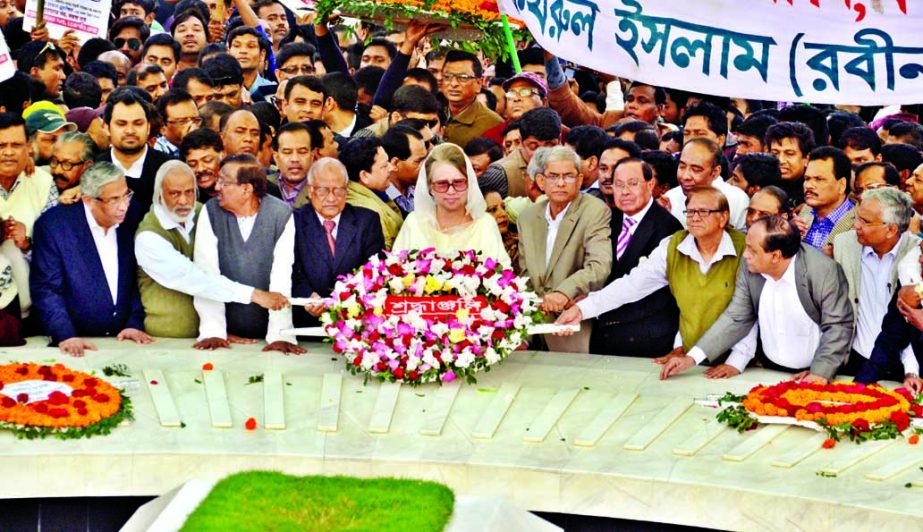 BNP Chairperson Begum Khaleda Zia along with party leaders and activists paying tributes to party founder Shaheed President Ziaur Rahman by placing floral wreaths at his mazar in the city on Tuesday marking his 80th birth anniversary.