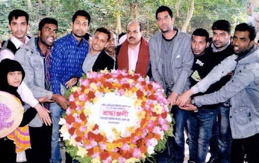 BNP leaders of Chittagong placing wreaths at the first grave of Shaheed President Ziaur Rahman yesterday.