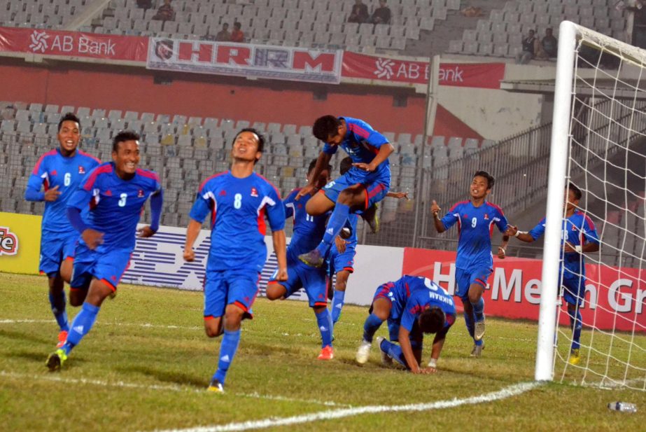 Players of Nepal celebrating after scoring a goal against Maldives in their semi-final match of the Bangabandhu Gold Cup International Football Tournament at the Bangabandhu National Stadium on Tuesday.