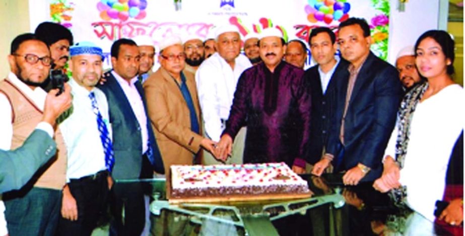 Md Anowar Hossain, Chairman and Mir Nazim Uddin Ahmed, Chief Executive of Islami Commercial Insurance Co. Ltd, cutting the cake to observe its 16th anniversary at the company's head office, Motijheel in the city recently.