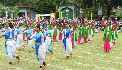 KISHOREGANJ: Students of SV Govt Girls' School are participating in a colourful display at the school compound on Wednesday.