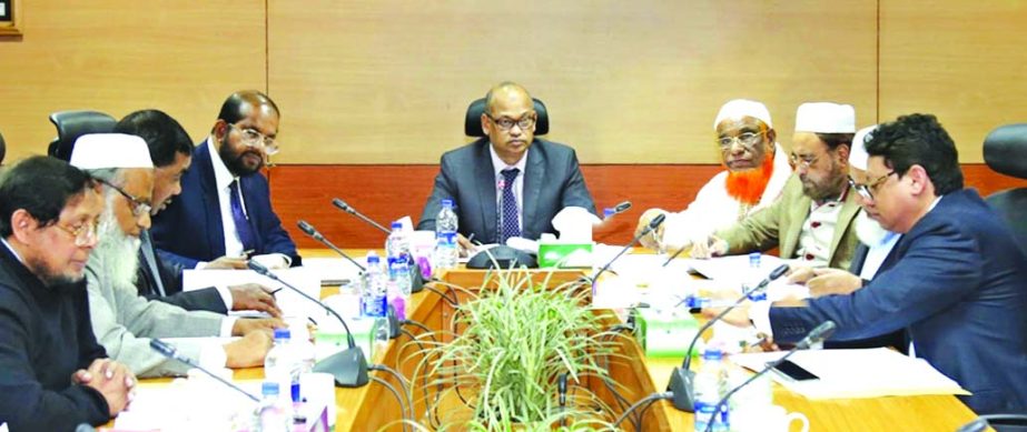 Abdus Samad, Chairman of Executive Committee Meeting of the Board of Directors of Al-Arafah Islami Bank Limited, presiding over the519th meeting at the Board Room of the bank on Thursday. Md Habibur Rahman, Managing Director of the bank was present.
