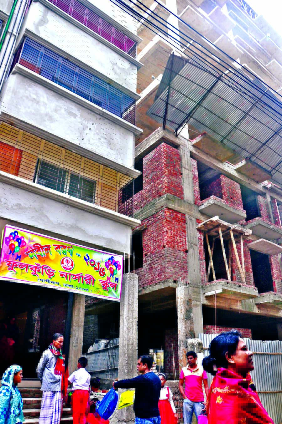 Insufficient precautionary measures in under construction buildings in the city may cause serious threat to the life of pedestrians any time. This photo was taken yesterday from in front of 'Fulkuri Nursery School' running in the ground floor of a house