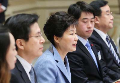 South Korean President Park Geun-hye, center, speaks during a joint briefing from the foreign, unification and defense ministries at the presidential house in Seoul on Friday.