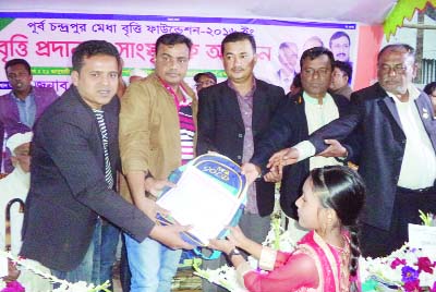 FENI: Jainal Abedin Mamun, Vice Chairman, Dagonbhuiyan Upazila distributing prizes among the winners of scholarship and cultural programme organised by Purbo Chandrapur Maydha Briti Foundation on Thursday.