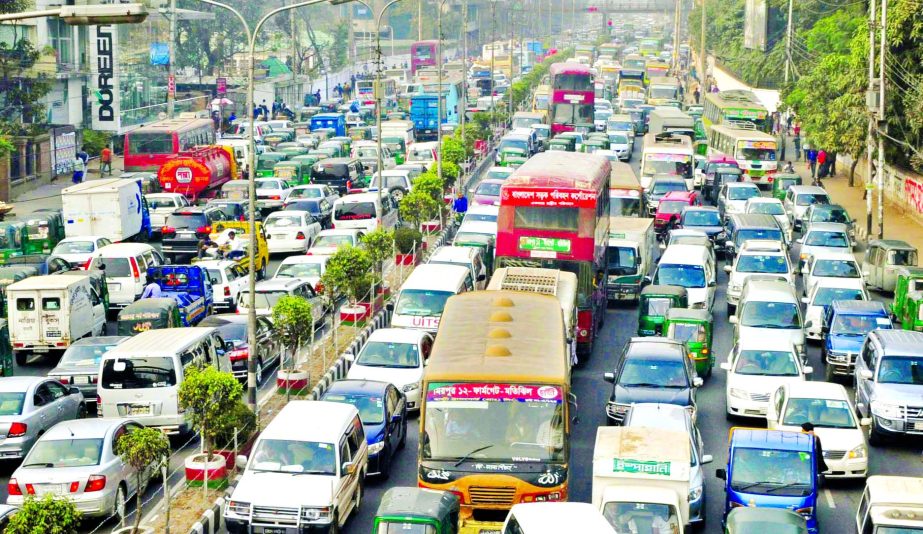 The city witnessed severe traffic gridlock on week-end Friday as vehicles remain struck up in streets due to huge crowd at Dhaka International Trade Fair causing sufferings to commuters as well as visitors to the Fair. This photo was taken from Farmgate a