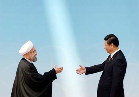 Iran's President Hassan Rouhani (L) receiving his Chinese counterpart Xi Jinping before the opening ceremony of the fourth Conference on Interaction and Confidence Building Measures in Asia (CICA) summit in Shanghai.