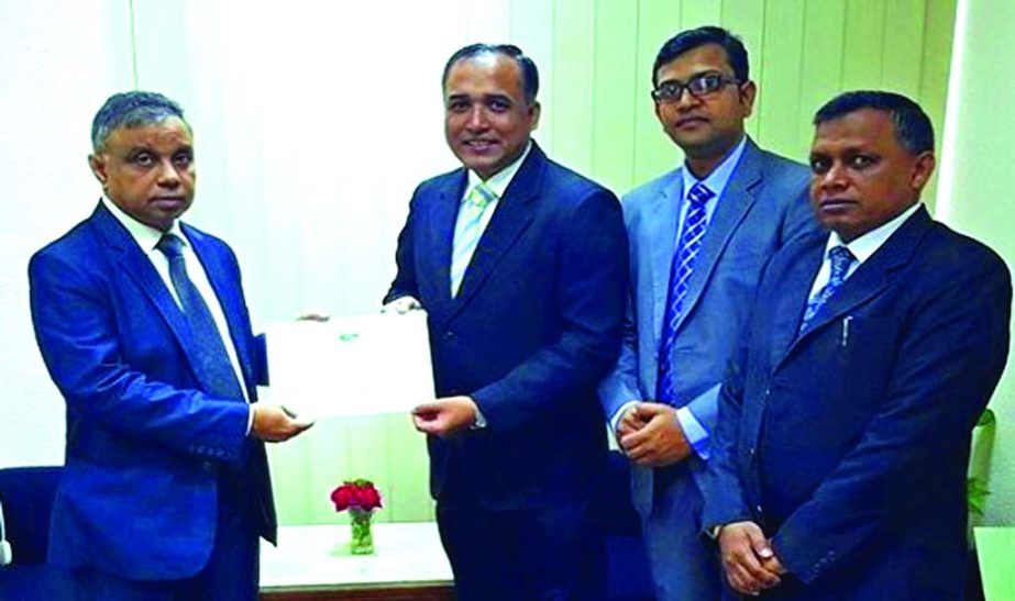Abul Kalam Azad, Principal Secretary to Prime Minister, receiving a cheque of Tk 10 lac from SM Formanul Islam Executive Director of BIFFL for PM's Relief and welfare Fund. Md Sagir Hossain Khan, GM (Investment) and Mohammad M Khan, Company Secretary we