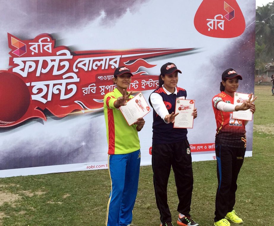 Selected three female fast bowlers from Mymensingh of Robi Fast Bowler Hunt Programme pose at the Mymensingh Circuit House Ground in Mymensingh on Saturday.