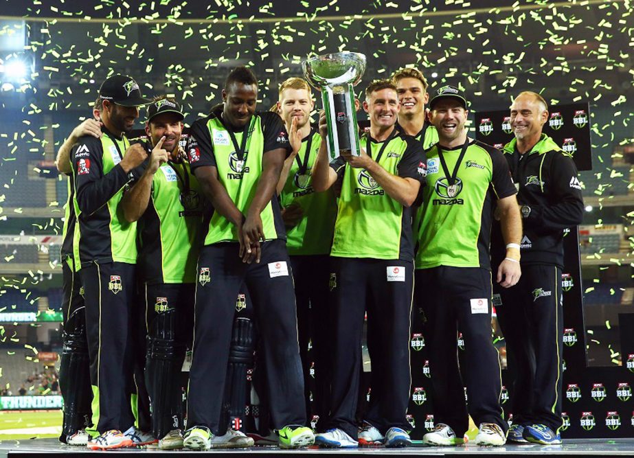 The Sydney Thunder players get-together after sealing the title beating Melbourne Stars in the BBL final in Melbourne on Sunday.
