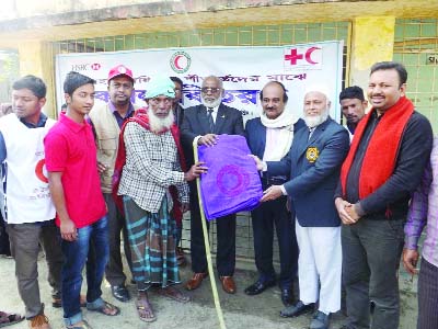 SHARIATPUR: Officials of Bangladesh Red Crescent Society, Shariatpur District Unit distributed blankets donated by HSBC Bank for cold-hit people on Sunday.