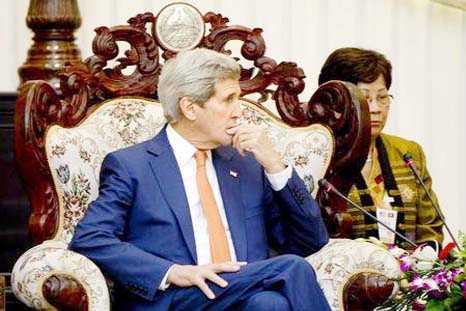 U.S. Secretary of State John Kerry meets with Lao Prime Minister Thongsing Thammavong (unseen) at the Prime Minister's Office in Vientiane, Laos.