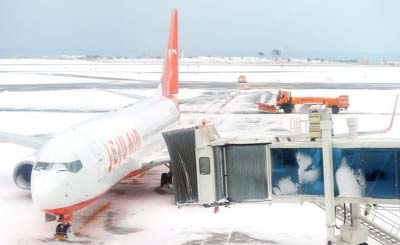 The airport was blanketed in snow over the weekend leading to flight cancellations