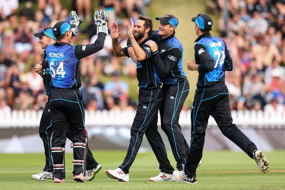 Grant Elliott celebrates one of his three wickets during the One Day International match between New Zealand and Pakistan at Basin Reserve in Wellington, New Zealand on Monday.