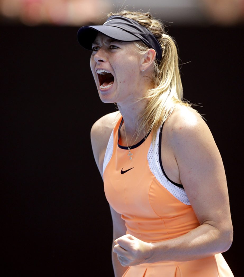 Maria Sharapova of Russia celebrates after winning a point against Serena Williams of the United States during their quarterfinal match at the Australian Open tennis championships in Melbourne, Australia, Tuesday.