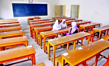 As teachers remain away from class following strike students find an exclusive moment for gossiping at Government Badrunnesa College in the city on Tuesday.