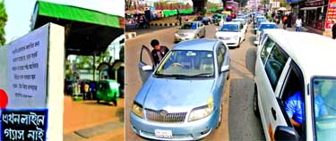 This CNG fuelling station has put the sign "Gas not available in pipeline"" highlighting gas crisis in the city as motorists line up in long queue at Mohakhali CNG Station."