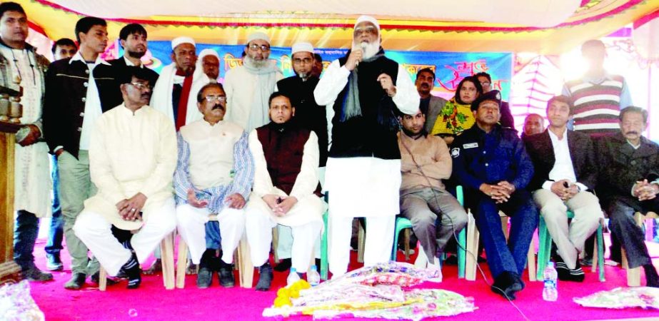 DUPCHANCHIA (Bogra): Alhaj Momtaj Uddin, President, Bogra District Awami League speaking at the inauguration programme of road dividers and beatification works of municipality in Dupchanchia Upazila recently.