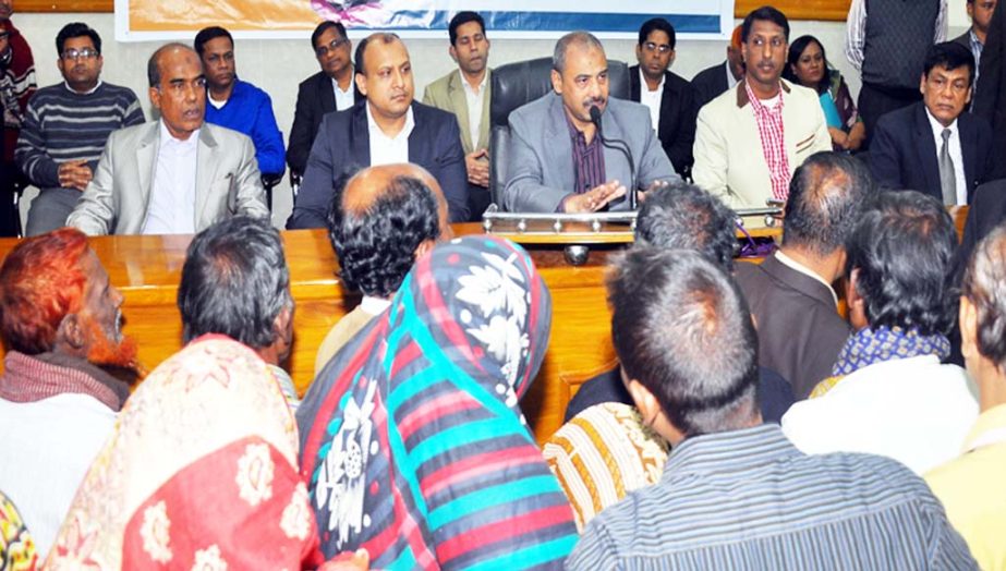 CCC Mayor AJM Nasir Uddin speaking at a meeting with cleaners at KB Abdus Sattar Auditorium on Tuesday.