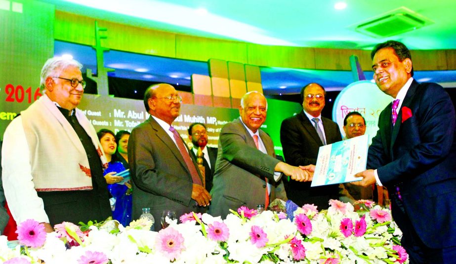 Finance Minister MA Muhith handing over the 'Certificate of Merit' to BGMEA president Md Siddiqur Rahman on the custom day organized by National Board of Revenue in the city on Tuesday. Commerce Minister Tofail Ahmed was present.