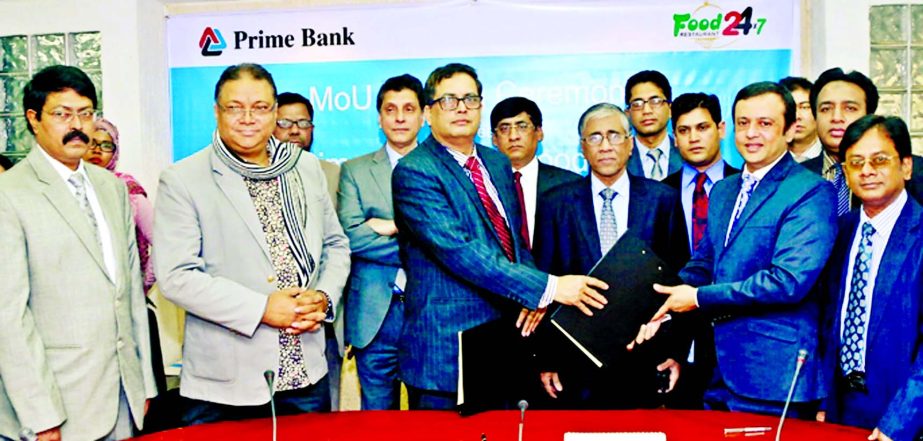 Md Tabarak Hossain Bhuiyan, Deputy Managing Director of Prime Bank Ltd and Riaz Uddin Ahmed Siddique, Co-founder & Director Marketing of Food 24x7 sign an agreement at the bank head office on Thursday. Managing Director of Prime Bank Ahmed Kamal Khan Chow