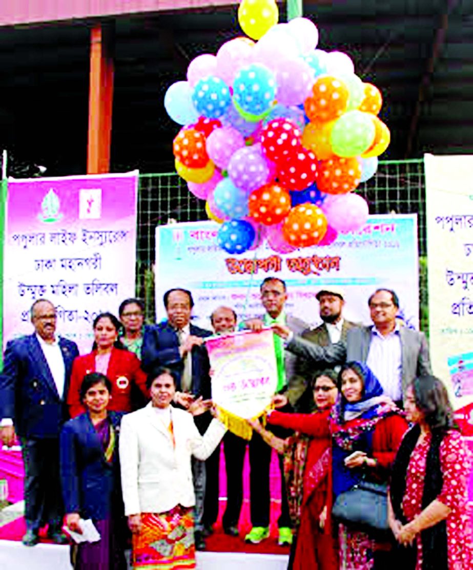 Secretary of the National Sports Council Ashoke Kumar Biswas inaugurating the Popular Life Insurance Dhaka Metropolis Open Women's Volleyball Competition by releasing the balloons as the chief guest at the Dhaka Volleyball Stadium on Friday.