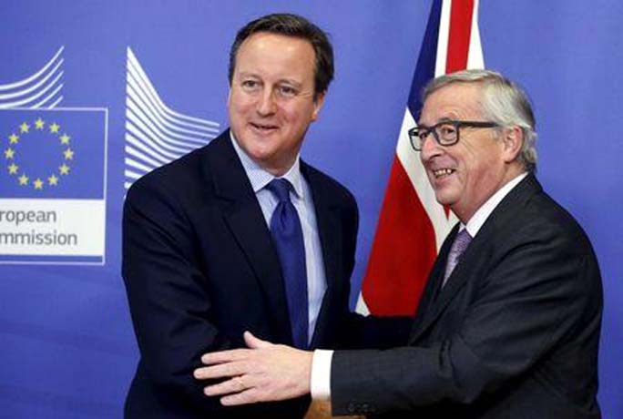 Britain's Prime Minister David Cameron shaking hands with European Commission President Jean-Claude Juncker (R) ahead of a meeting at the EU Commission headquarters in Brussels, Belgium on Friday.