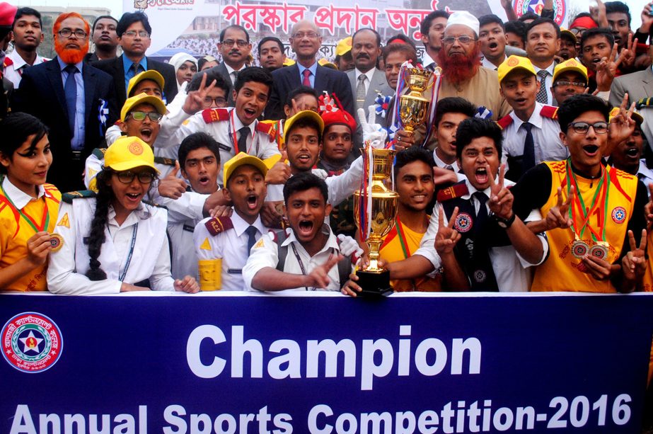 Bir Shreshtha Hamidur Rahman House and Bir Shreshtha Captain Mohiuddin Jahangir House, the champions and the runners-up respectively of the Annual Sports Competition of Adamjee Cantonment College with Minister for Education Nurul Islam Nahid pose for a ph