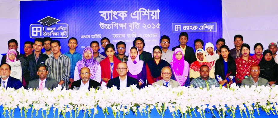 Rumee A Hossain, Chairman of the Board Executive Committee of Bank Asia, handing over Bank Asia Higher Studies Scholarship-2015 to 39 insolvent meritorious students of Chatkhil & Sonaimuri Upazila of Noakhali and Ramgonj & Chandrogonj Upazila of Laxmipur,