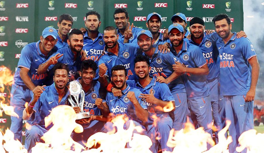 India pose with the T20I series trophy after 3rd T20I against Australia in Sydney on Sunday.