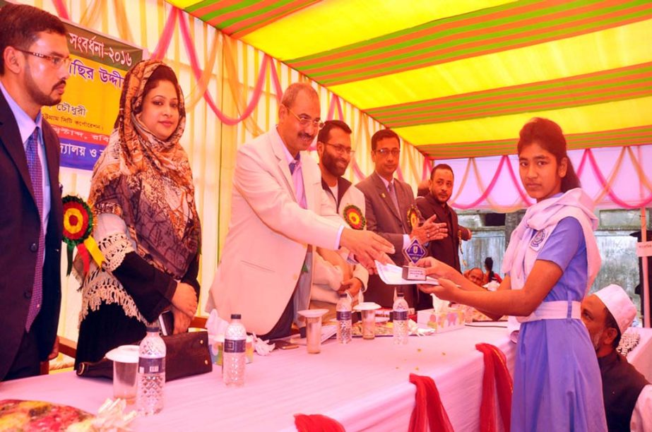 CCC Mayor A J M Nasir Uddin distributing prizes among the winners of annual sports and cultural competition of Fatehbad Bohumukhi City Corporation Girls' High School and College as Chief Guest on Sunday.