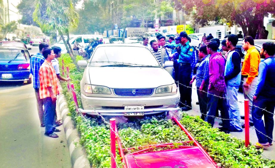 A car rams into an island at Gulshan area as driver lost control of steering on Monday.