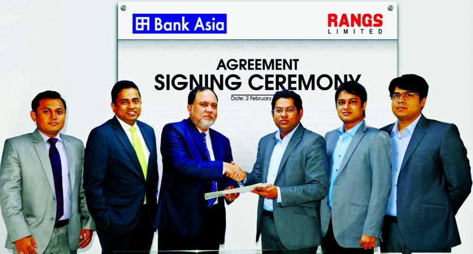 Muhammad Zahirul Alam, Deputy Managing Director of Bank Asia Ltd and Shoeb Ahmed, CEO of Rangs Limited, exchanging documents after signing MOU in presence of Sultanuzzaman Sazan, Head of Operation, Khaan M Saakib Us Salehin, Assistant General Manager, Mar