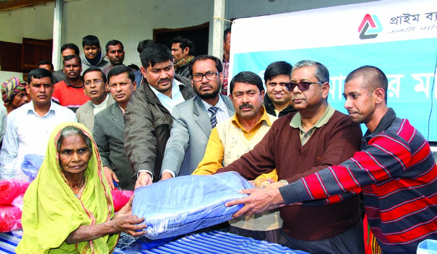 Md Golam Rabbani, Deputy Managing Director of Prime Bank Ltd, distributing blankets among the poor in Sherpur and Dhunat Upzillas, Bogra recently.