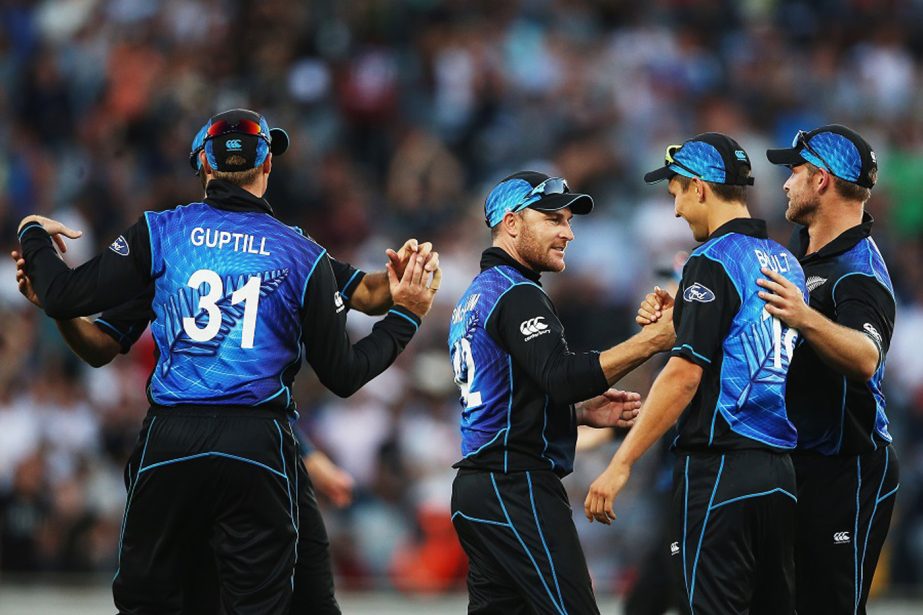 Brendon McCullum celebrates with team-mates after winning his final match at Eden Park at Auckland on Wednesday.