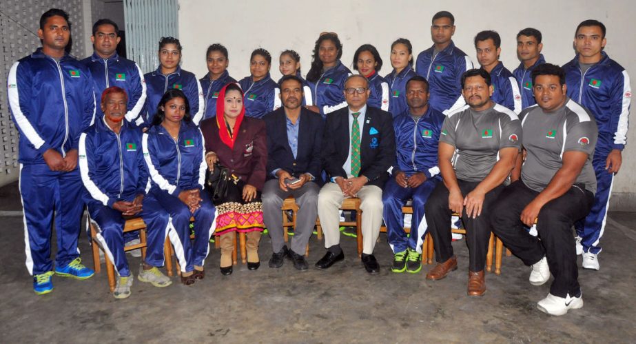 Members of Bangladesh Weightlifting team pose for a photo session in the city on Wednesday before leaving for India to take part in the South Asian Games scheduled to be held in India.