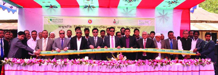 Deputy Minister for Environment and Forests Abdullah Al Islam Jakob, MP, inaugurating the "Modhumoti Digital Banking" at Boheratoil and Kakrajan UDC Agent Point at Boheratoil Public High School premises, Shakipur, Tangail on Thursday.