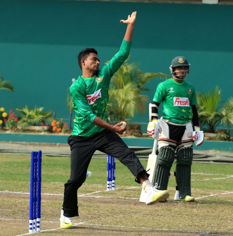 Players of Bangladesh Under-19 Cricket team (left) and members of Nepal Under-19 Cricket team during their practice session at BCB-NCA Academy Ground on Thursday. Bangladesh will meet Nepal in the first quarter-final of the ICC Under-19 Cricket World Cup