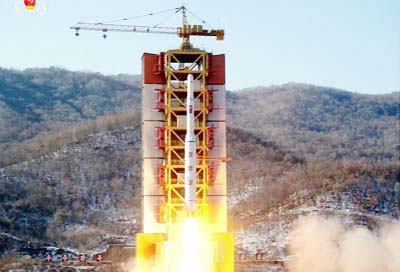 Picture taken from North Korean TV and released by South Korean news agency Yonhap shows North Korea's rocket launch.