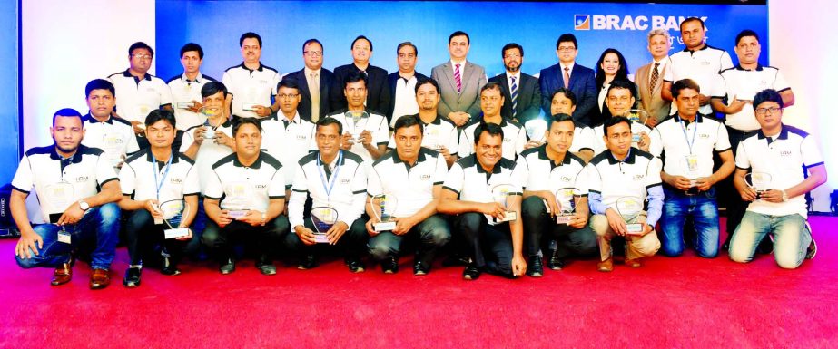 Selim RF Hussain, Managing Director, BRAC Bank Limited, poses with the participants of a "CRO Convention 2016" of its SME Banking of the Dhaka Region in the city recently. Ishtiaq Mohiuddin, Deputy Managing Director of the bank and more than 500 sales o