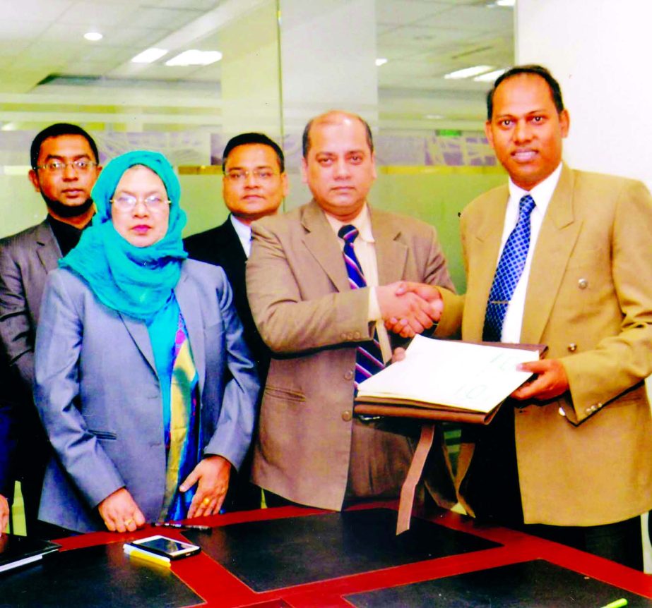 Mohammad Ali, Deputy Managing Director & Chief Technical Officer of Pubali Bank Ltd and Khairul Anam, Head of Sales, Ocean Paradise Hotel & Resort sign a MoU in the city recently. Under this agreement PBL credit and debit card holders will avail up to 50