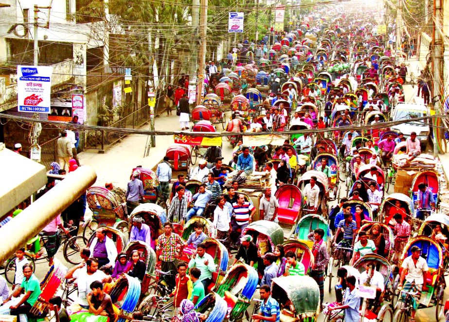 Thousands of rickshaws and vehicles got stuck around the Science Laboratory area as Dhaka City College HSC examinees blocked the street on Sunday.